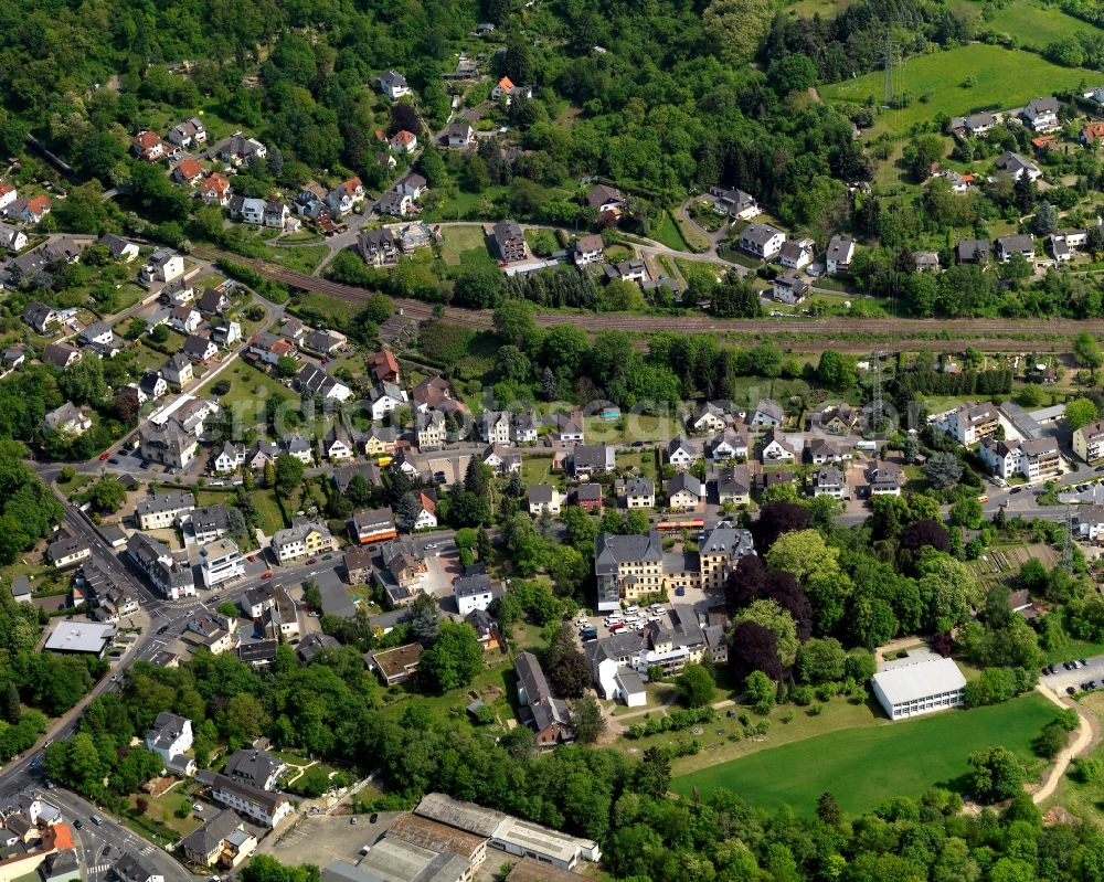 Aerial photograph Bendorf - View of the Sayn part of the town of Bendorf in the state of Rhineland-Palatinate. The town is located in the county district of Mayen-Koblenz on the right riverbank of the river Rhine. The town is an official tourist resort and is located on the German Limes Road. It consists of the four parts Bendorf, Sayn, Muelhofen and Stromberg. Sayn is located in the North of Bendorf