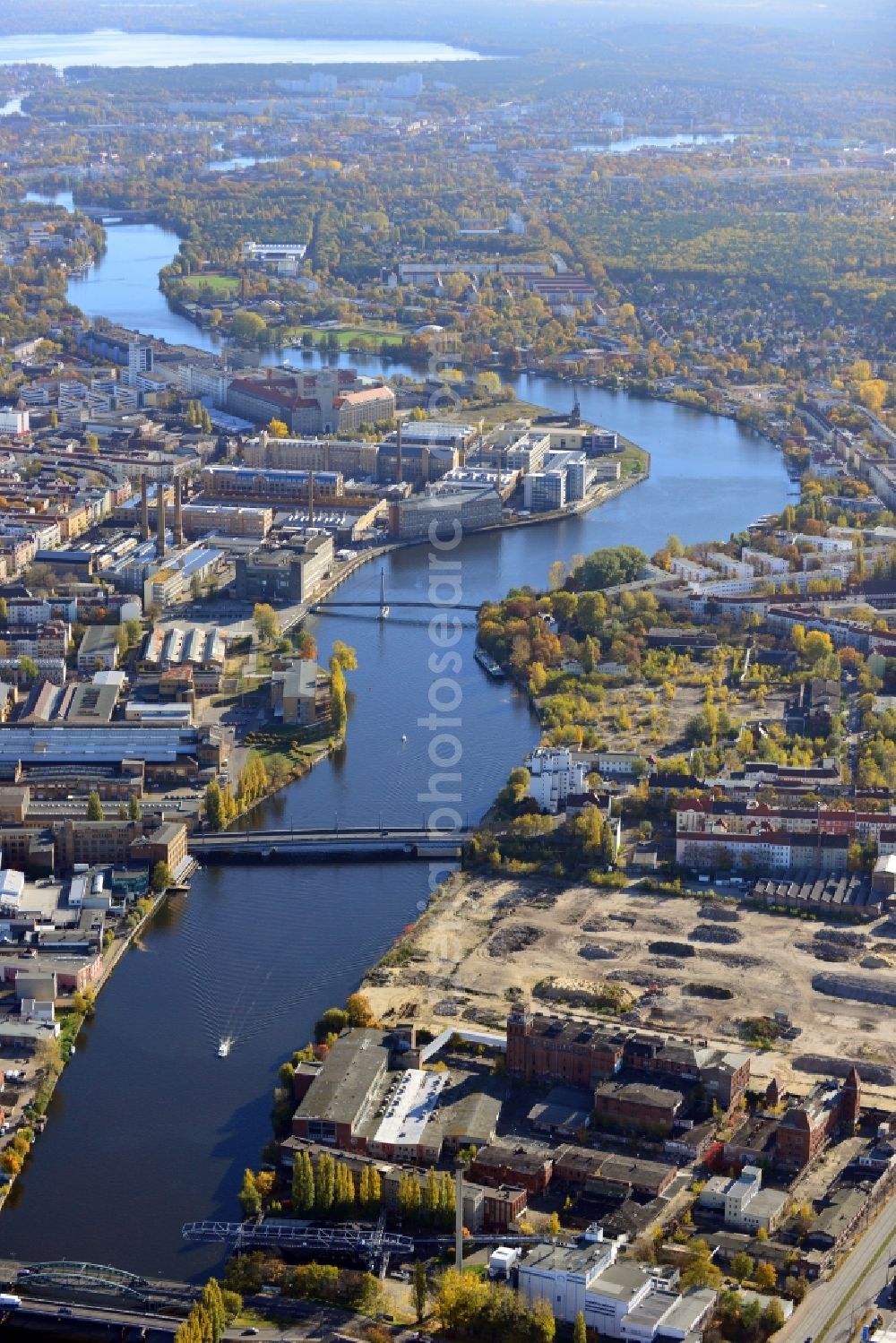 Aerial image Berlin - View of Schöneweide in the Berlin borough Treptow-Köpenick. Schöneweide is the designation for the two districts Niederschöneweide and Oberschöneweide in the borough Treptow-Köpenck. The river Spree separates the two districts from each other