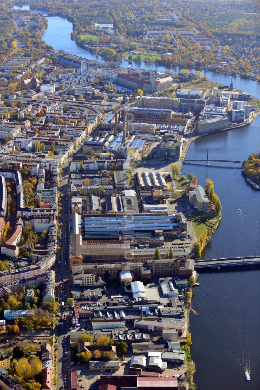 Berlin from above - View of Schöneweide in the Berlin borough Treptow-Köpenick. Schöneweide is the designation for the two districts Niederschöneweide and Oberschöneweide in the borough Treptow-Köpenck. The river Spree separates the two districts from each other