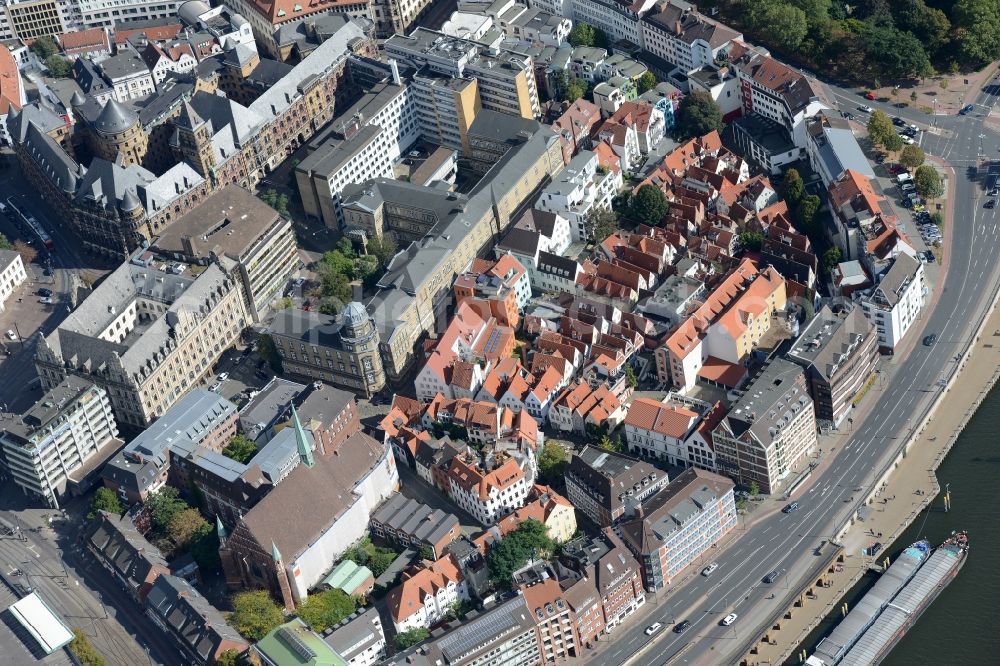 Aerial image Bremen - View of the Schnoor quarter in the historic city centre and on the riverbank of the Weser in Bremen in Germany. The medieval quarter is located in the South of the city centre and along the street of the same name