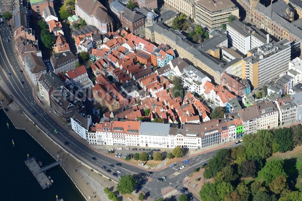 Aerial image Bremen - View of the Schnoor quarter in the historic city centre and on the riverbank of the Weser in Bremen in Germany. The medieval quarter is located in the South of the city centre and along the street of the same name