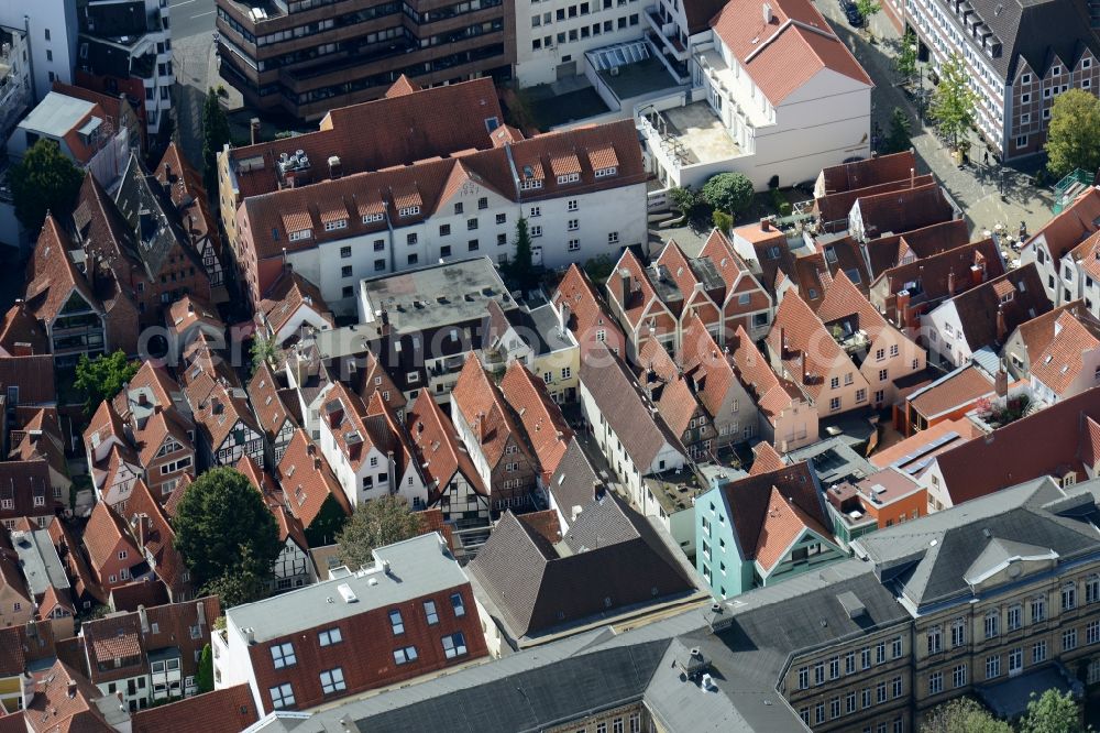 Bremen from the bird's eye view: View of the Schnoor quarter and the Museum Geschichtenhaus in the historic city centre and on the riverbank of the Weser in Bremen in Germany. The medieval quarter is located in the South of the city centre and along the street of the same name