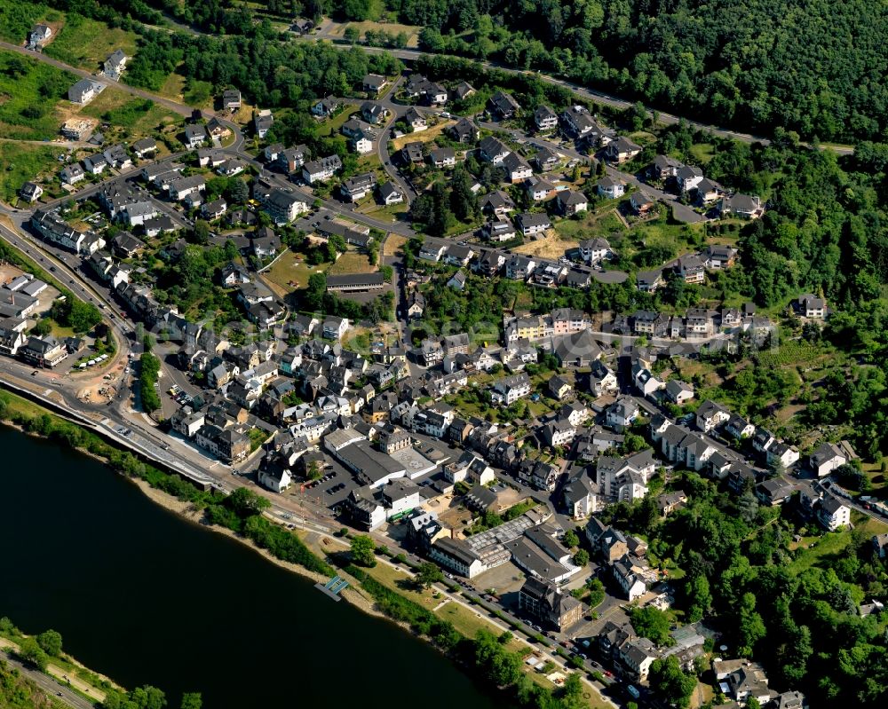 Aerial image Cochem - View of the Sehl part of Cochem in the state of Rhineland-Palatinate. Cochem is the largest town of the Cochem-Zell county district and is located in a bend of the river, surrounded by woods and hills. The Sehl part of the town is located on the left riverbank in the South of the town