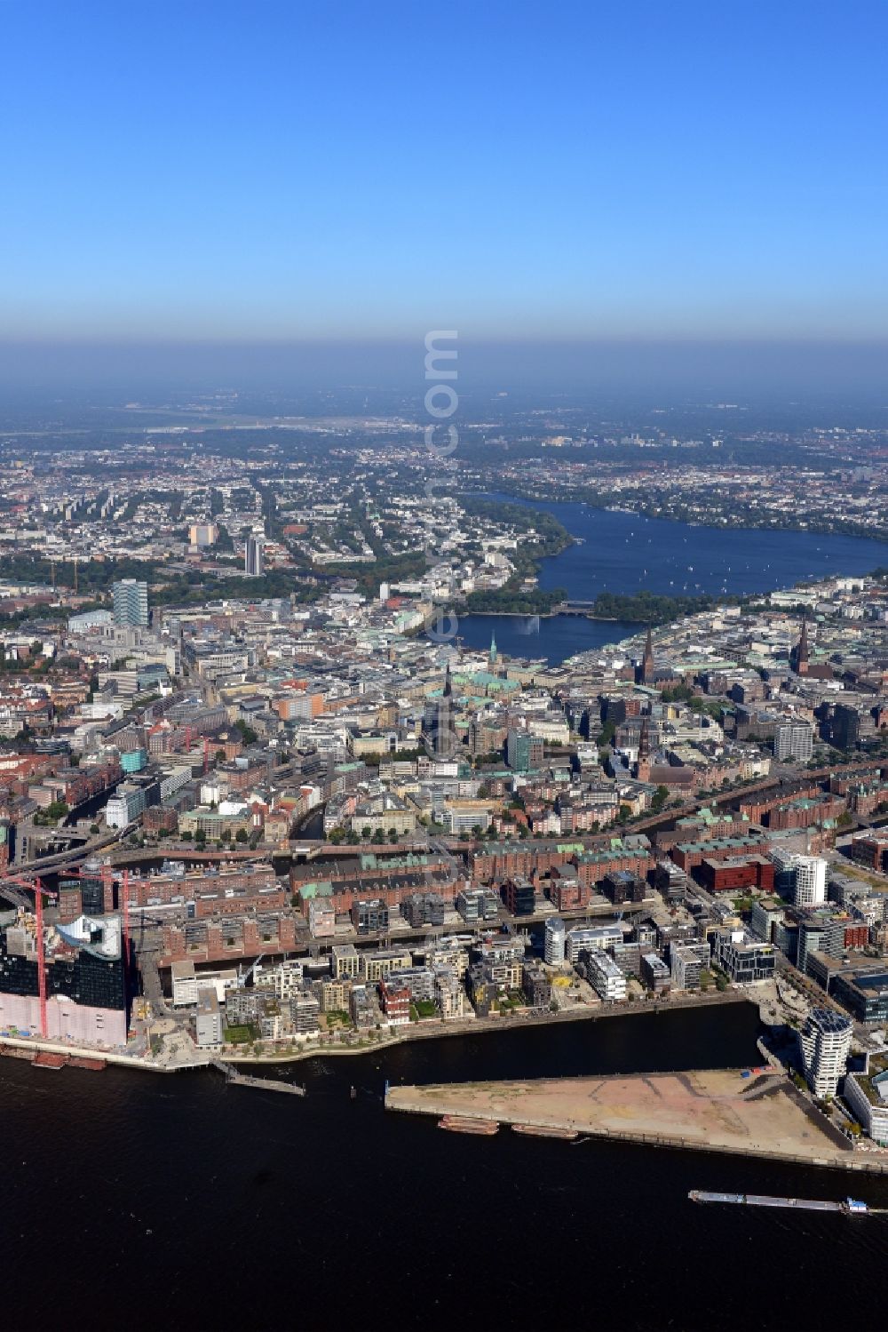 Hamburg from the bird's eye view: View of the downtown area and city center of Hamburg in Germany. View from the Elbe across Neustadt, Altstadt and Alster-area. The urban development area HafenCity is located in the foreground on Strandkai