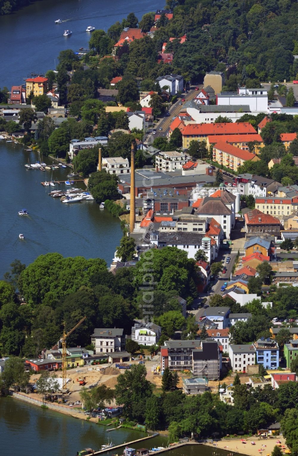 Berlin from above - Partial view of the city Mueggelseedamm streets on the banks of the Mueggelsee in Berlin