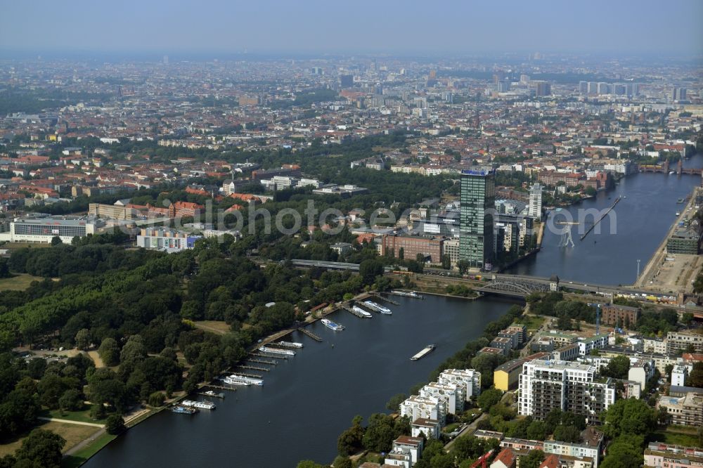 Aerial image Berlin - View of the Treptow and Friedrichshain-Kreuzberg parts along the river Spree in Berlin in Germany. View from the East towards Mitte. Several landmarks such as the Molecule Man and the Oberbaumbruecke Bridge are visible