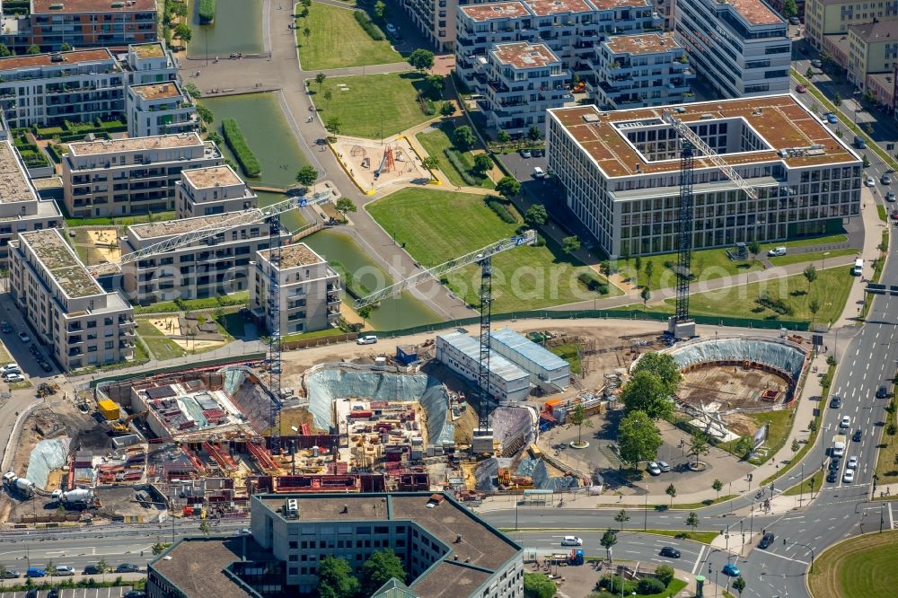 Aerial photograph Essen - View of the University Quarter and the construction site for the office building of Funke Media Group on Berliner Platz in Essen in the state of North Rhine-Westphalia. The shopping mall Limbecker Platz is located in the foreground