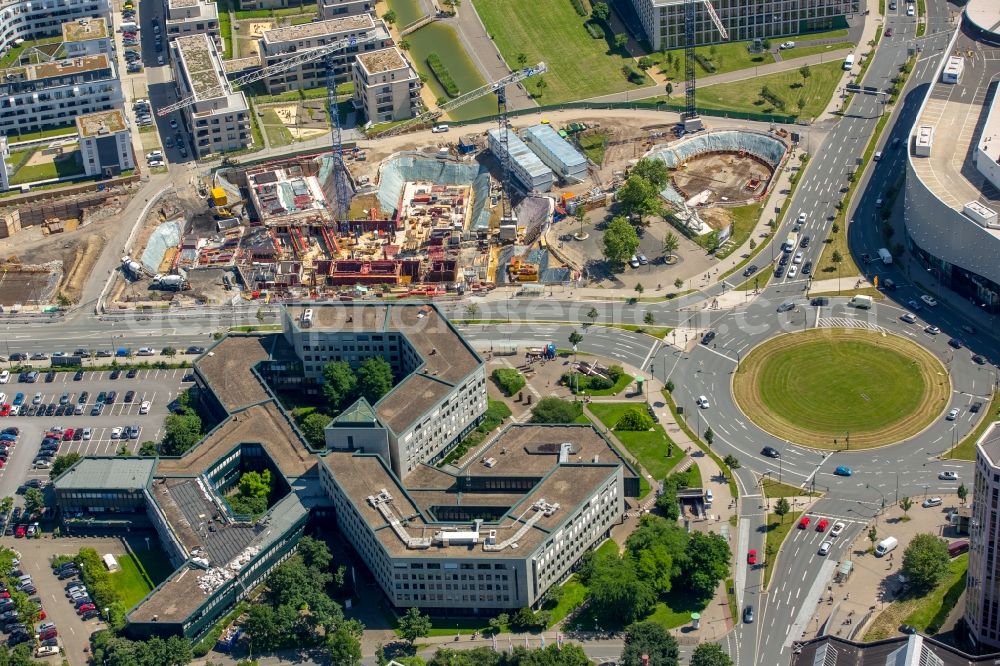 Aerial photograph Essen - View of the University Quarter and the construction site for the office building of Funke Media Group on Berliner Platz in Essen in the state of North Rhine-Westphalia. The shopping mall Limbecker Platz is located in the foreground