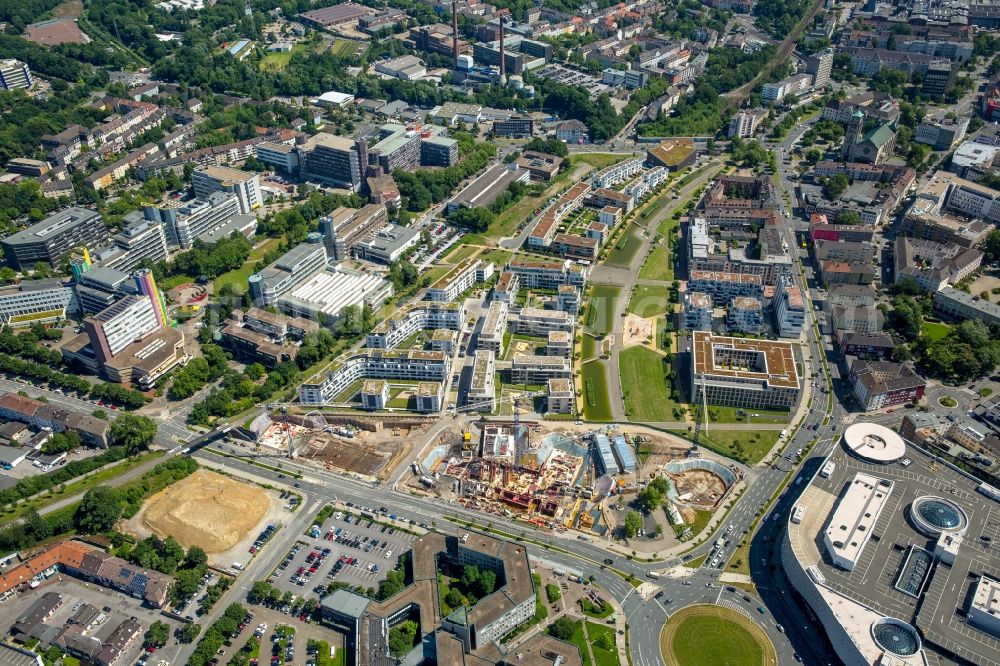 Aerial photograph Essen - View of the University Quarter and the construction site for the office building of Funke Media Group on Berliner Platz in Essen in the state of North Rhine-Westphalia. The shopping mall Limbecker Platz is located in the foreground