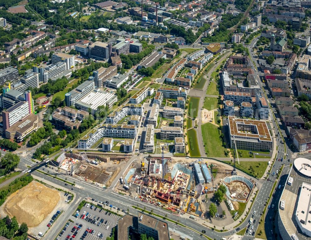 Essen from above - View of the University Quarter and the construction site for the office building of Funke Media Group on Berliner Platz in Essen in the state of North Rhine-Westphalia. The shopping mall Limbecker Platz is located in the foreground