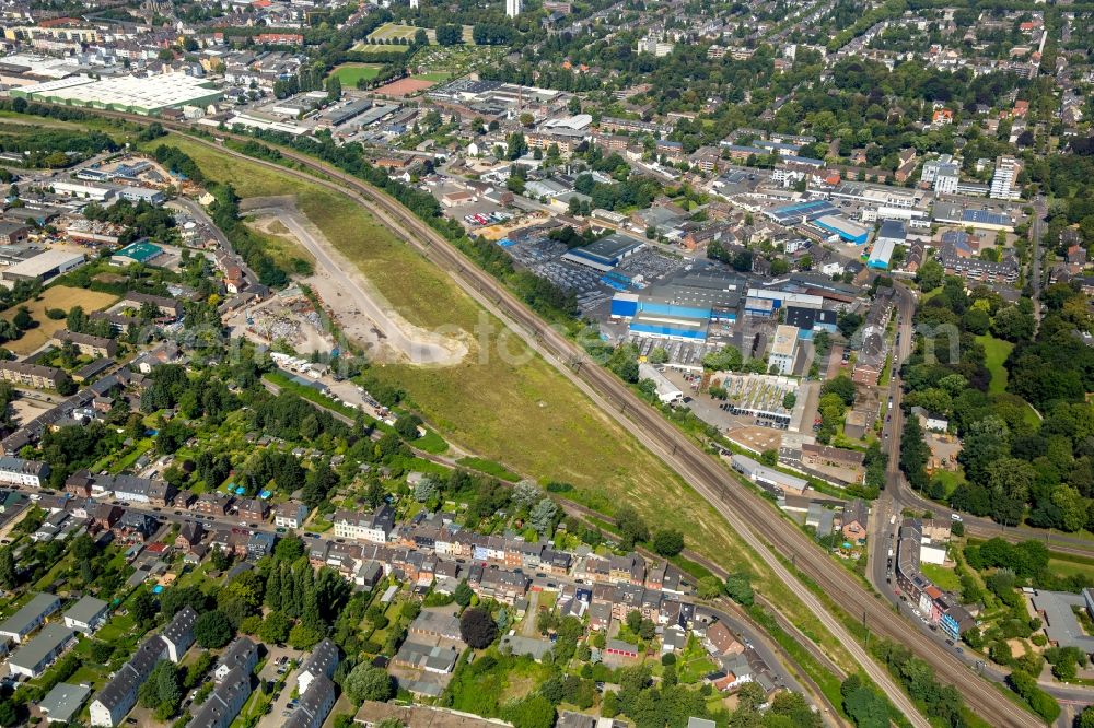 Krefeld from the bird's eye view: View of the West of Krefeld with industrial and commercial areas along railway tracks in the state of North Rhine-Westphalia