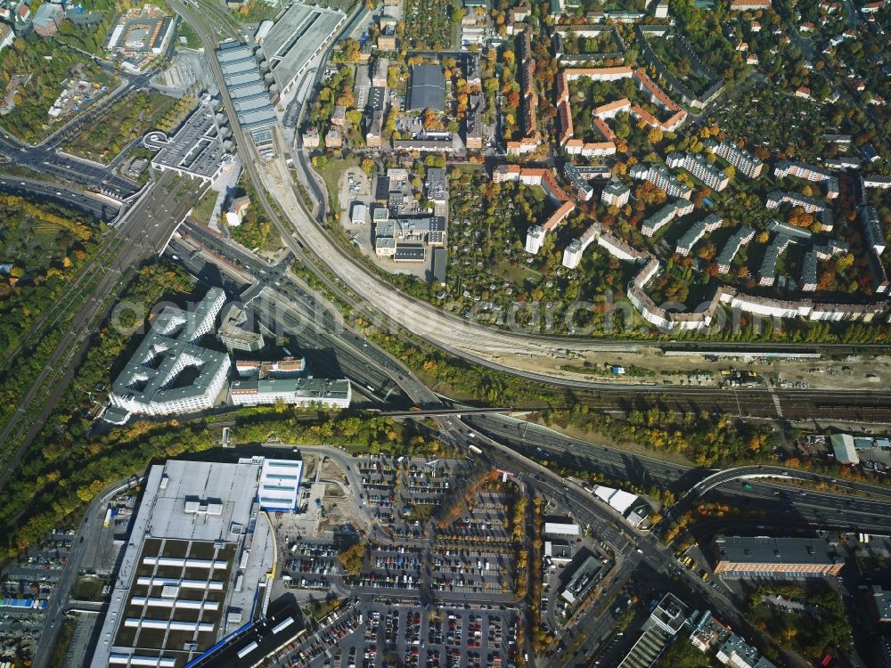 Aerial image Berlin - View of the residential area in the North of the city motorway A100 and railway tracks in the district of Tempelhof-Schoenebeg in Berlin in Germany. The motorway takes its course in West-Eastern direction parallel to the railway tracks of S-Bahn and Ringbahn rail lines. The residential area consists of residential estates and single family houses of the Fliegerviertel quarter