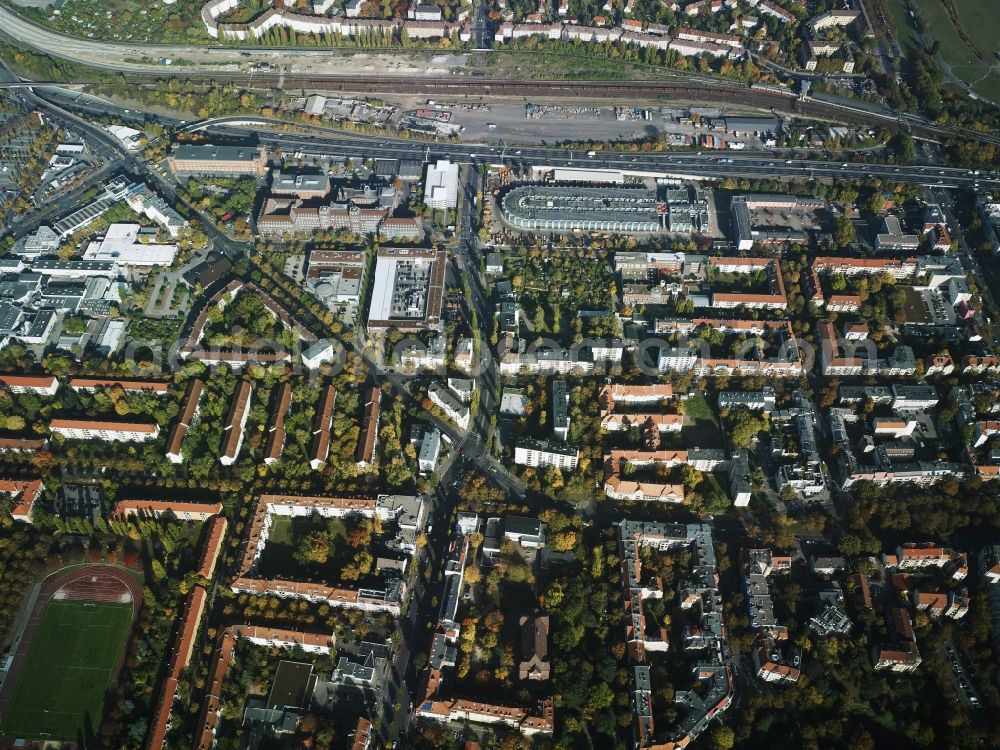 Aerial image Berlin - View of the residential area in the South of the city motorway A100 and Ringbahn in the district of Tempelhof-Schoenebeg in Berlin in Germany. View to the North along Manteuffelstrasse. The distinct elongated building includes the headquarters of Berliner Stadtreinigung (maintenance and cleaning)