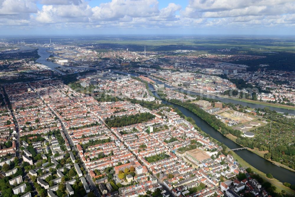 Bremen from above - View of the residential area of the Neustadt part in the South of Bremen in Germany. Multi family homes and residential buildings are located along the symmetrically ordered streets. The background shows the historic city centre of Bremen and the river Weser