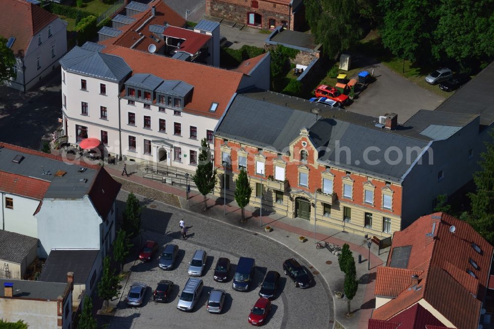 Werneuchen from above - View of the group of buildings at the course of the road Breite Strasse - Am Markt with the municipality and the town hall of Werneuchen in the state Brandenburg