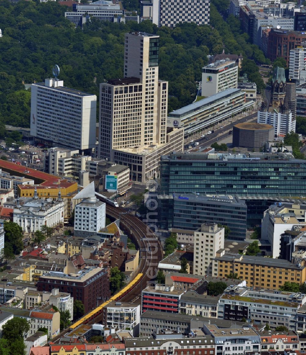 Berlin from the bird's eye view: Group of buildings alongside the S-Bahn-track between the streets Kurfuerstendamm und Kantstrasse in the district Berlin Charlottenburg. You can see the CityQuartier Neues Kanzler-Eck, the highrise Zoofenster, the church Kaiser-Wilhelm-Gedaechtniskirche and the reconstructed Bikini-Haus