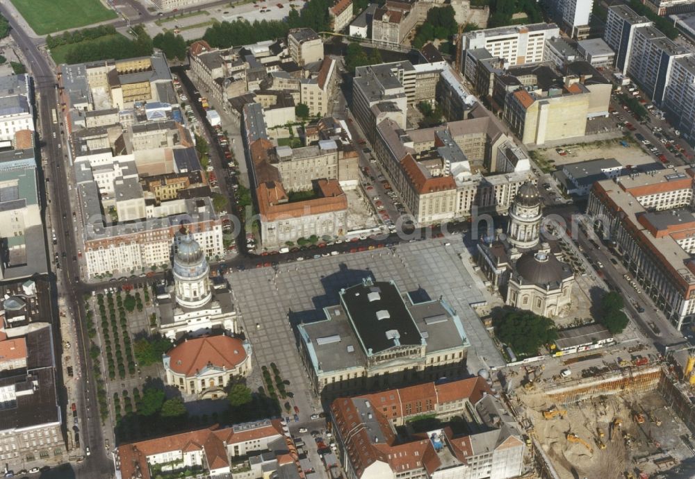 Berlin from the bird's eye view: Cityscape from Berlin city center with the Gendarmenmarkt in Berlin with the Berlin Schauspielhaus, German- and French Cathedral. Outside around residential and commercial buildings along the Markgrafenstrasse Mohr Street, Frederick Street and French Street