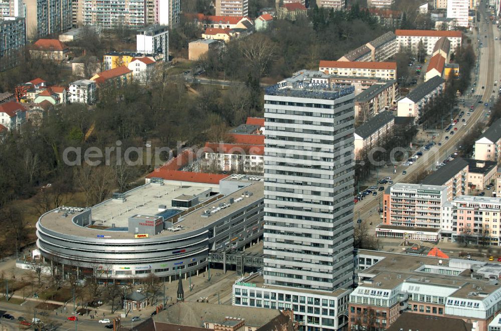 Frankfurt (Oder) from above - Blick auf den 89 m hohen Oderturm in Frankfurt (Oder). Im Hintergrund das Einkaufszentrum Lenné-Passagen und der von Peter Joseph Lennés gestaltete Stadtpark. Rechts der Magistrale genannte Teil der Karl-Marx-Straße. View of the 89 m high Oderturm in Frankfurt (Oder). The office building was built between 1968 and 1976. In the background the shopping mall Lenné-Passagen and the city park, designed by Peter Joseph Lenné. At the right the part of the Karl-Marx-Strasse which is called Magistrale .