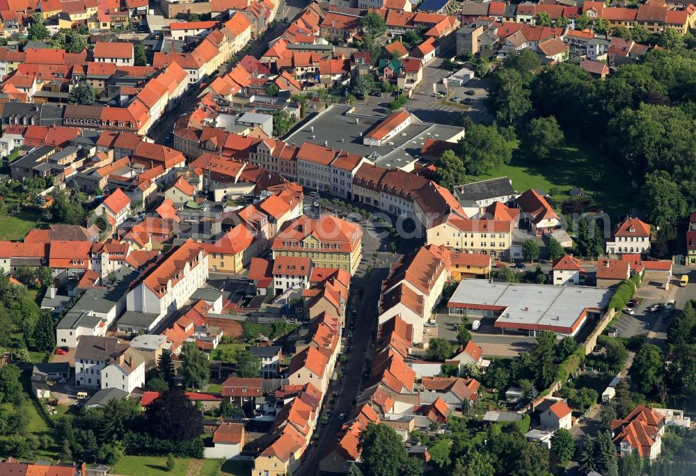 Aerial photograph Ohrdruf - On the marketplace in Ohrdruf in Thuringia is the historic City Hall. As the surrounding town houses on the market street, the town hall was built in the 19th century