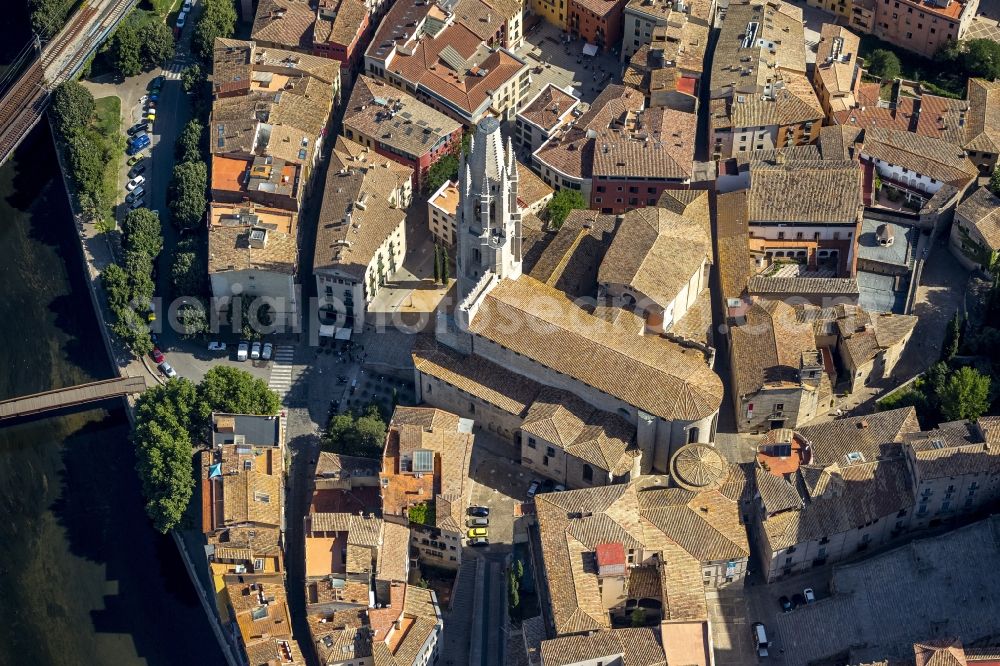 Aerial image Girona - City center of downtown with the Catedrale de Santa Maria de Girona and Sant Feliu church in Girona in Spain