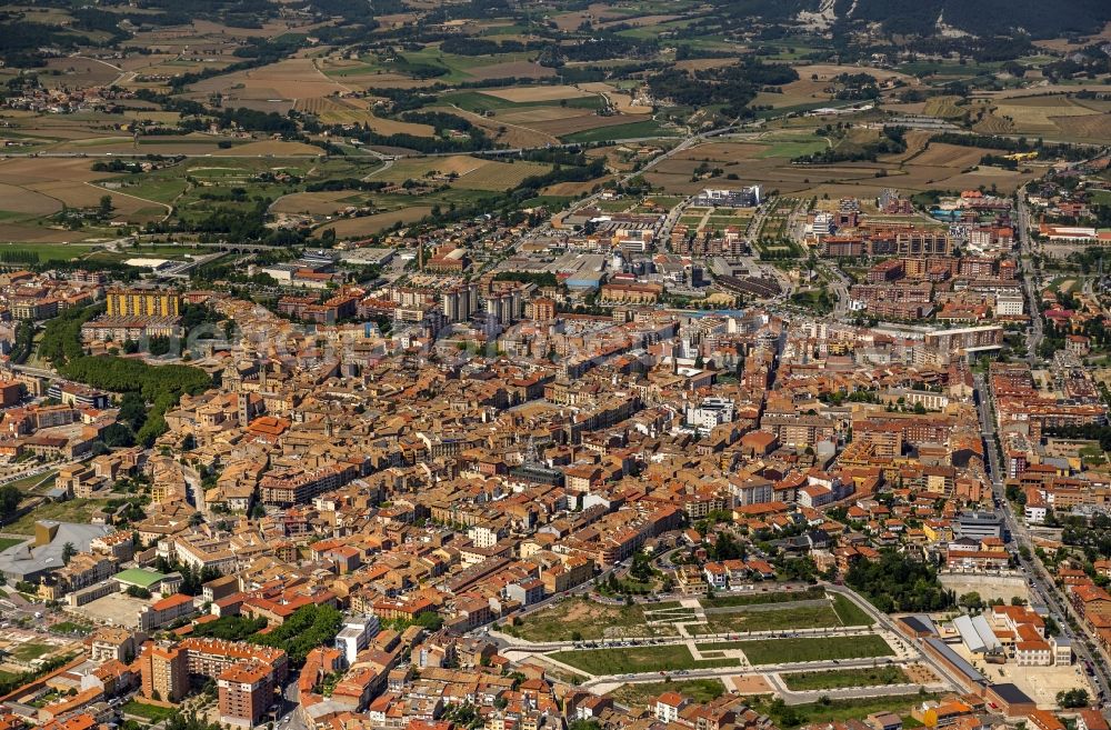 Vic from above - City center of downtown with its historic old town with Placa Major square in Vic, Spain