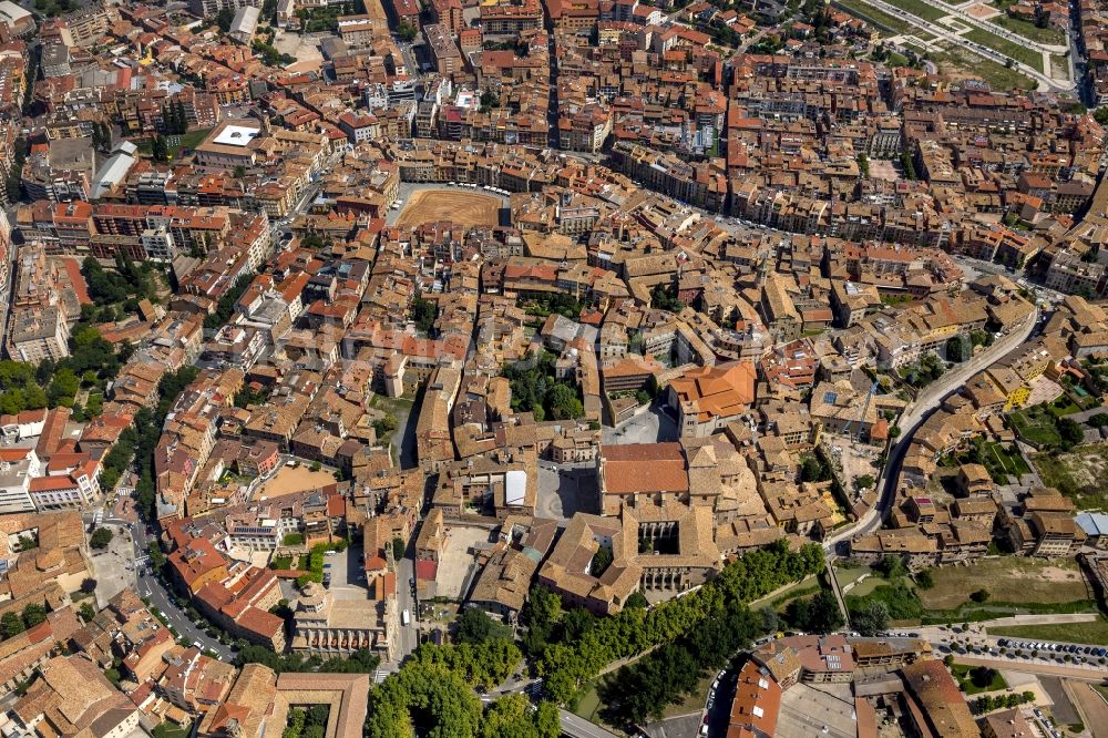Vic from above - City center of downtown with its historic old town with Placa Major square in Vic, Spain
