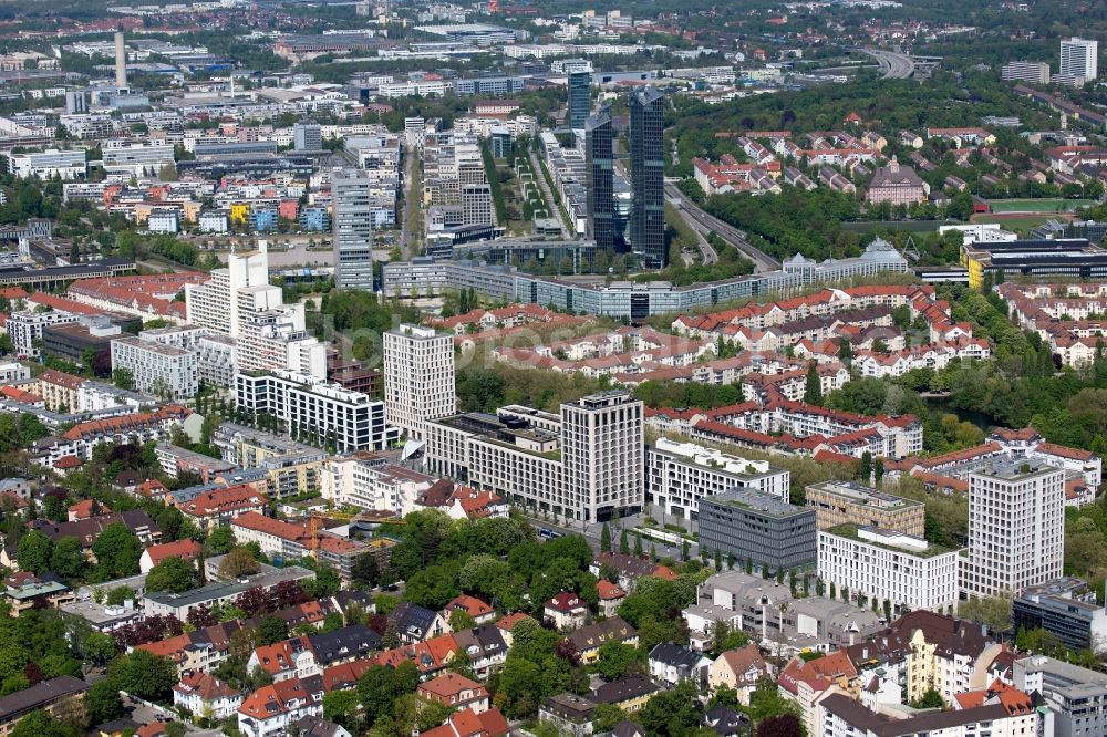 München from above - The city center in the downtown area overlooking the road course of the Leopoldstrasse with office buildings and high-rise buildings in Munich in the state Bavaria, Germany