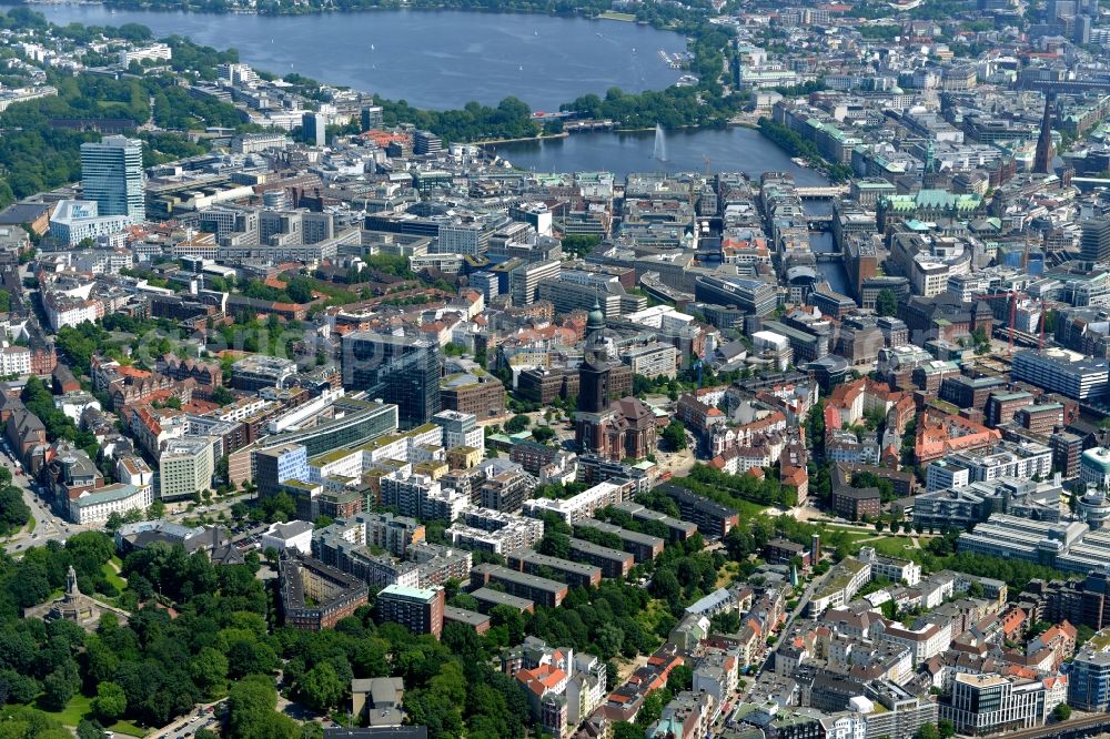 Hamburg from the bird's eye view: City center and downtown area of Hamburg in Germany. The background shows the Alster river, St. Michaelis church is located in the foreground