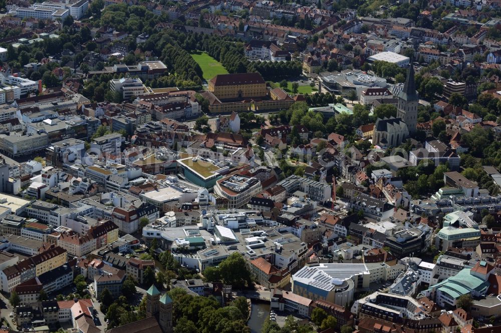 Osnabrück from above - View of the town centre of Osnabrueck in the state of Lower Saxony. The background shows the Castle of Osnabrueck - the main building of the University of the town - with its park. Next to it, St. Katharinen church is visible with its high tower