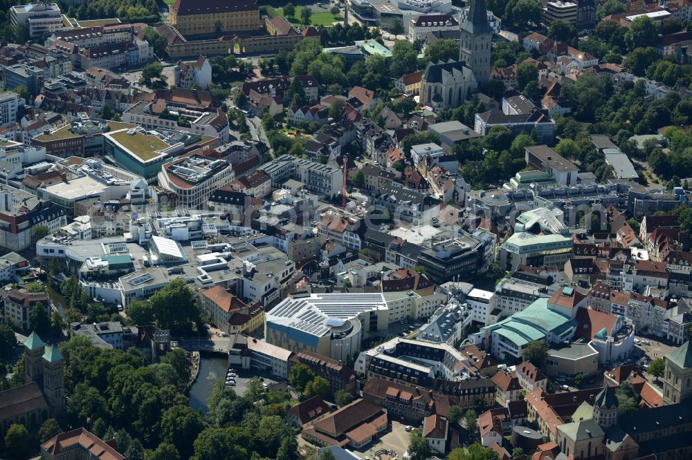 Osnabrück from the bird's eye view: View of the town centre of Osnabrueck in the state of Lower Saxony. The background shows the Castle of Osnabrueck - the main building of the University of the town - with its park. Next to it, St. Katharinen church is visible with its high tower