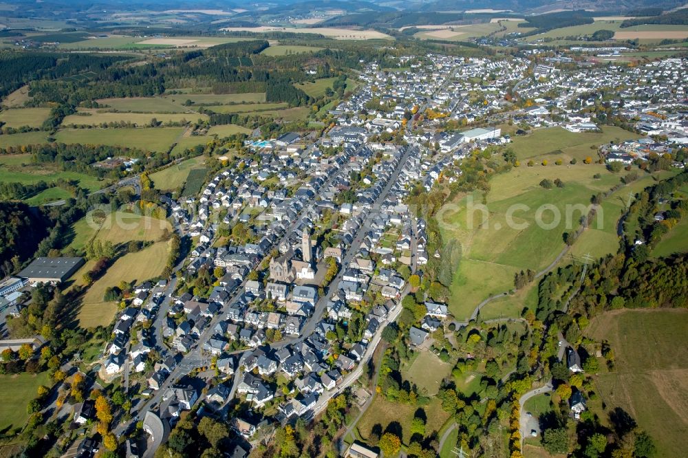 Schmallenberg from the bird's eye view: The city center in the downtown area near the Oststrasse und Weststrasse. In the picture the catholic parish church st. Alexan der in Schmallenberg in the state North Rhine-Westphalia