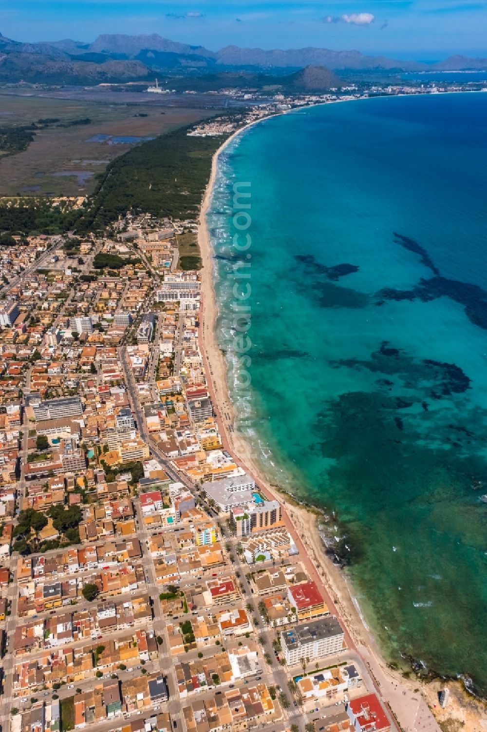 Aerial image Can Picafort - City center in the city center on the beach shore Passeig Enginyer Antoni Garau in Can Picafort in Balearic island of Mallorca, Spain