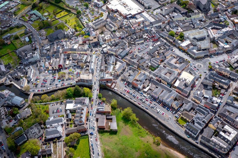 Aerial image Ennis - City center in the downtown area on the banks of river course Fergus River in Ennis in Clare, Ireland