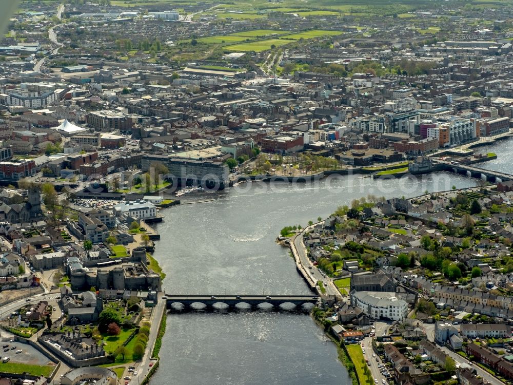 Limerick from the bird's eye view: City center in the downtown area on the banks of river course Shannon in Limerick in Limerick, Ireland
