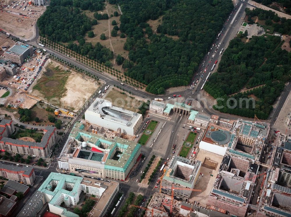 Berlin Mitte from above - View of the downtown center on the Pariser Platz and the Brandenburg Gate and the Unter den Linden in Berlin. In the picture the British Embassy at Hotel Adlon and the land for the construction of the U.S. - American Embassy and the Holocaust - Monument