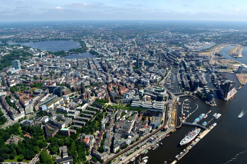 Hamburg from the bird's eye view: Downtown area and old city centre on the riverbank of the Elbe in Hamburg. The foreground shows the Elbe riverbank areas, the background shows the Aussenalster lake