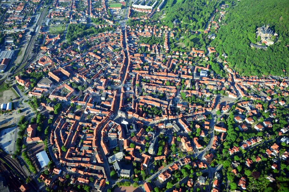 Wernigerode from above - City view of the Old Town the city center and the world famous monument of the city of Wernigerode Castle Wernigerode in Saxony-Anhalt