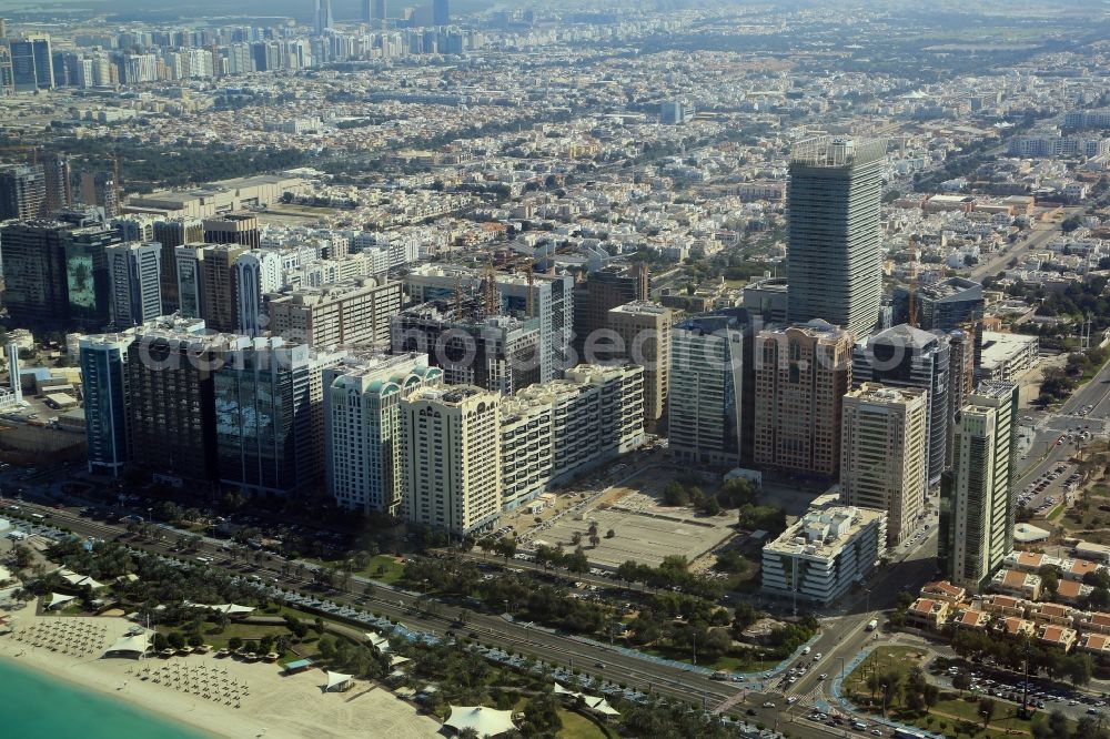 Abu Dhabi from the bird's eye view: City center with the skyline in the downtown area at Corniche Road in Abu Dhabi in United Arab Emirates