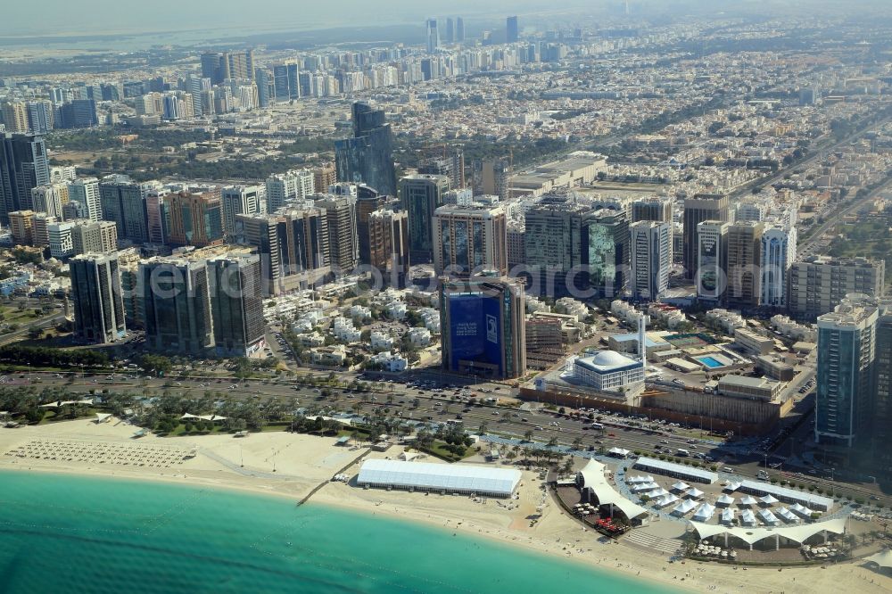 Aerial photograph Abu Dhabi - City center with the skyline in the downtown area at Corniche Beach in Abu Dhabi in United Arab Emirates