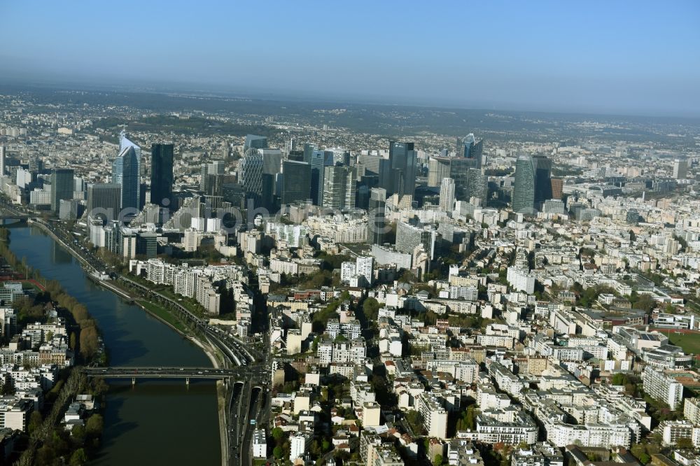 Paris from the bird's eye view: City center with the skyline in the downtown area La Defense in Paris in Ile-de-France, France