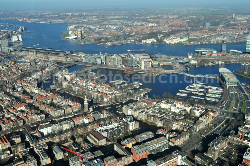 Amsterdam from the bird's eye view: City center with districts Nieuwmarkt en Lasttageund De Wallen Binnenstadt of Amsterdam in the Netherlands