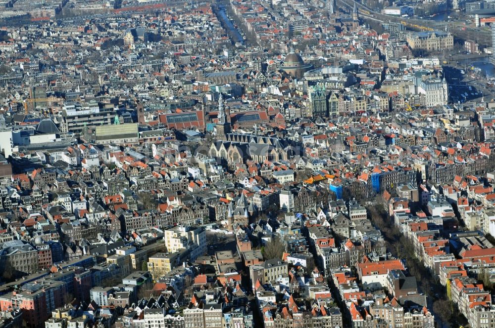 Aerial photograph Amsterdam - City center with residential areas and canals channels at the church Oude Kerk in the center of Amsterdam in the Netherlands