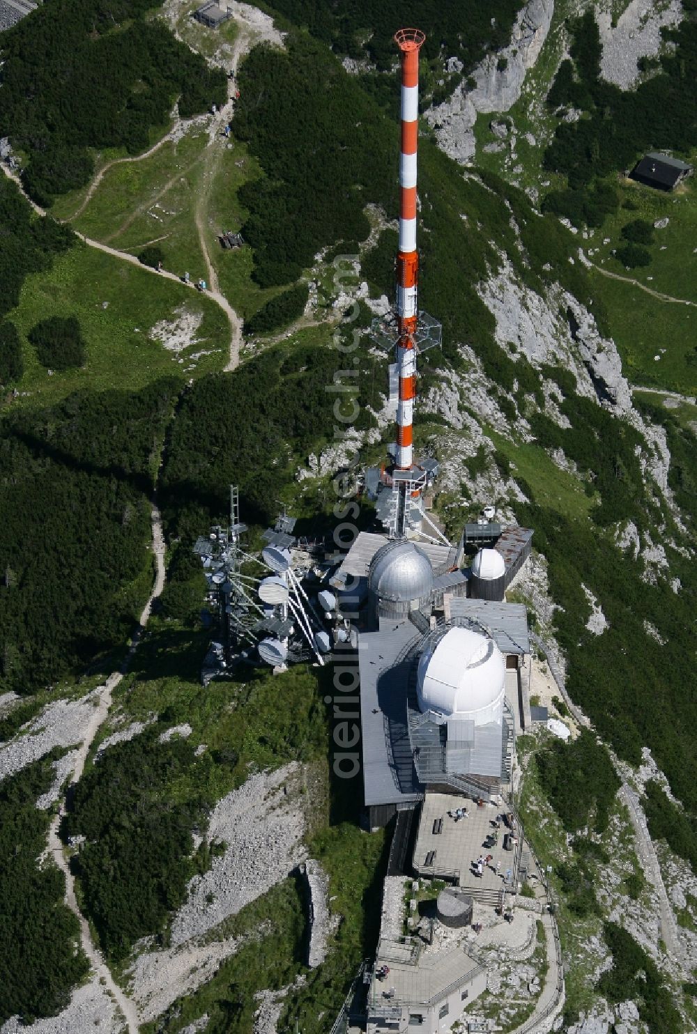 Bayrischzell from the bird's eye view: Steel mast funkturm and transmission system as basic network transmitter Sender Wendelstein in Bayrischzell in the state Bavaria, Germany