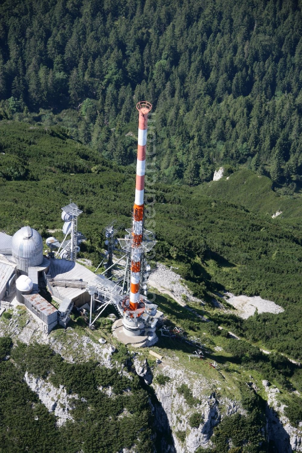 Bayrischzell from the bird's eye view: Steel mast funkturm and transmission system as basic network transmitter Sender Wendelstein in Bayrischzell in the state Bavaria, Germany