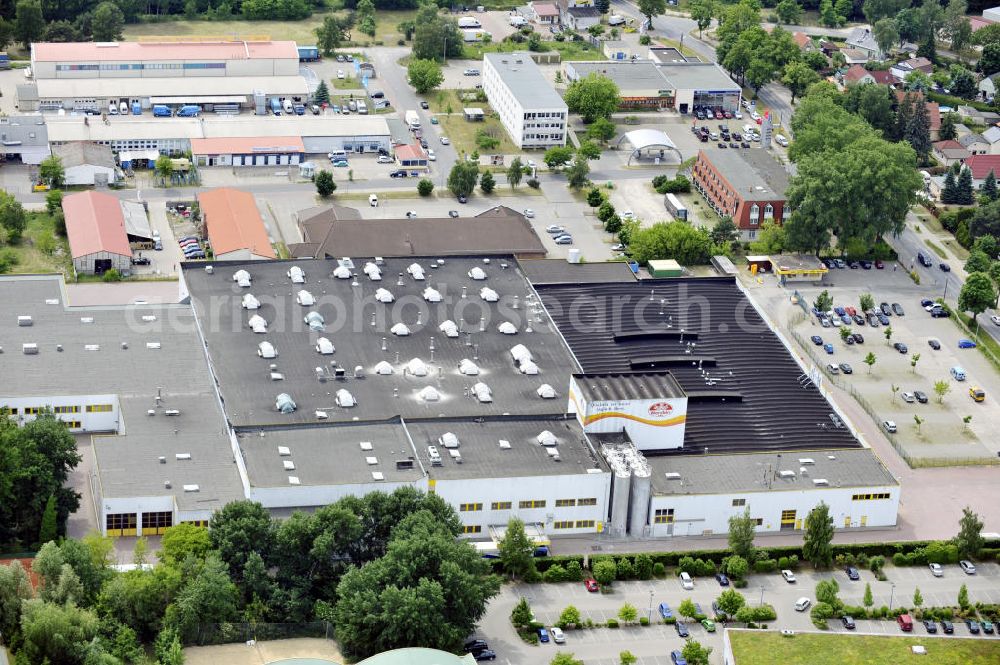 Aerial photograph Bernau - Blick auf einen Werksstandort der Lieken-AG in Bernau bei Berlin. Das Bäckereiunternehmen gehört seit 2002 zu dem italienischen Barilla-Konzern. Im Hintergrund ist eine Filiale des Aldi-Konzerns zu sehen. View to an work location of the Lieken-AG in Bernau near Berlin. Since 2002 the Bakery buisness is part of the italian Barilla-Group. In the Background is an branch of the Aldi-Group recognizeable.