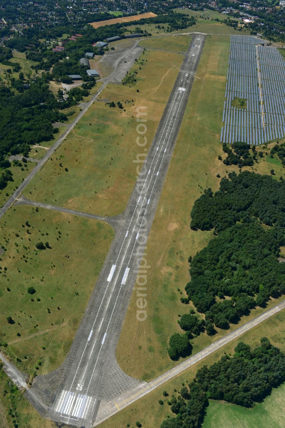 Aerial image Werneuchen - Start and runway with taxiways and shelters on the grounds of the airport in Brandenburg Werneuchen