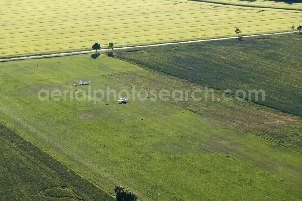 Pritzwalk from above - Start of a glider in an airplane tow in Pritzwalk-Sommersberg in the state Brandenburg, Germany