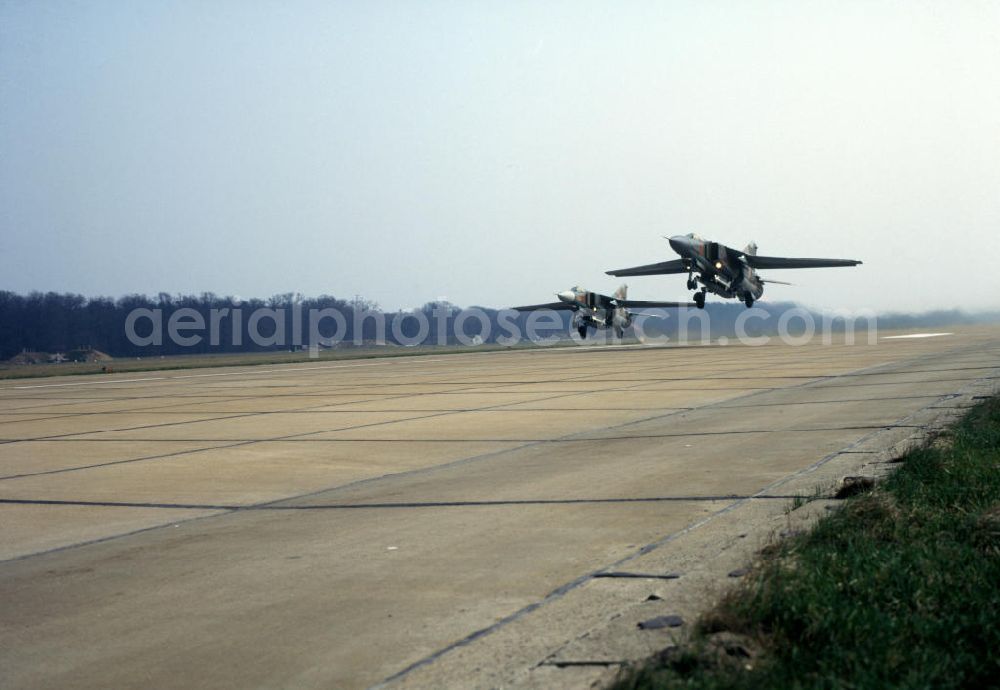 Aerial photograph Bautzen - Zwei Mig 23 / Jagdflugzeuge der Nationalen Volksarmee beim Start auf der Landebahn des NVA Flugplatz Bautzen.