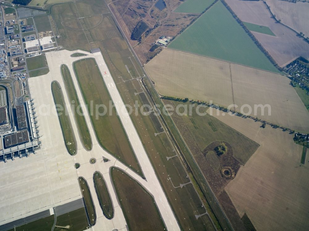 Schönefeld from the bird's eye view: Runway and taxiways at the site of the new airport BER / BBI BERLIN BRANDENBURG AIRPORT Willi Brandt in Schoenefeld in Brandenburg