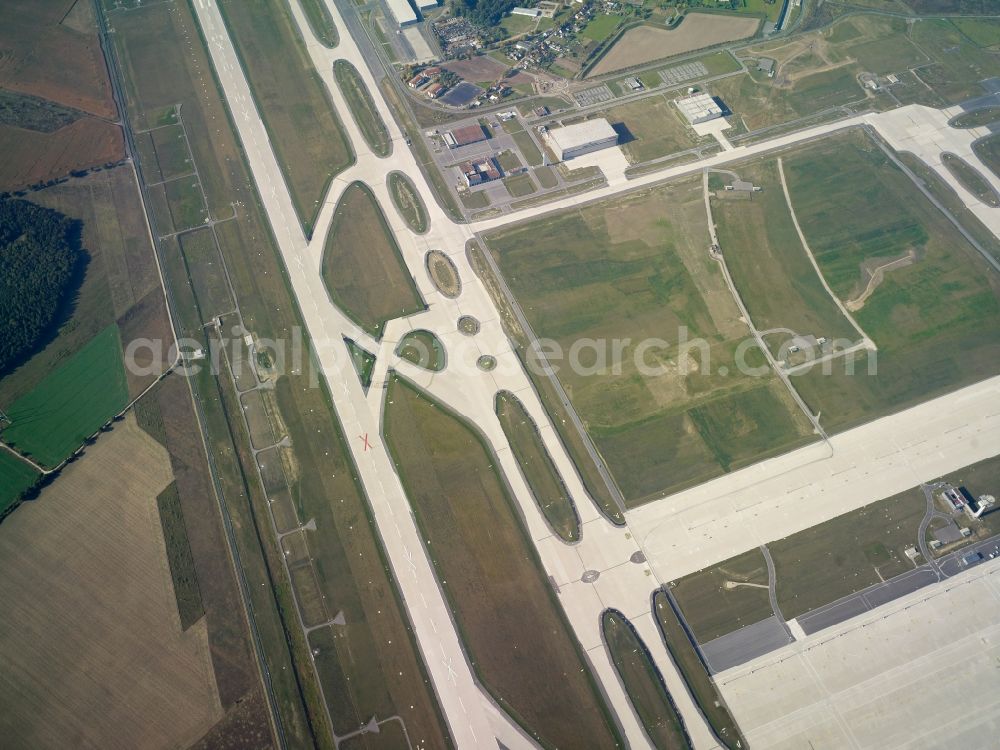 Schönefeld from the bird's eye view: Runway and taxiways at the site of the new airport BER / BBI BERLIN BRANDENBURG AIRPORT Willi Brandt in Schoenefeld in Brandenburg